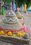 Tradition of carrying sand into the temple or monastery. Prayer flags on sand in Songkran day festival at Thailand