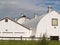 Tradition farm barns in white.