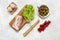 Tradition  Pancetta bacon served with pickled olives, tomatoes, green salad leaves, eggs and grissini bread, ingredients for