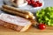 Tradition  Pancetta bacon served with pickled olives, tomatoes, green salad leaves, eggs and grissini bread, ingredients for