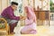 Traditional act of respect in Muslim family on Eid al-Fitr