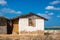 Traditional adobe house next to the sea