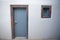Traditional Aegean architecture grey wooden door and window