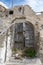 Traditional Aegean architecture wooden door in ruins