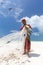 Traditional african local rural fishing on Paje beach, Zanzibar, Tanzania. Traditionally dressed local woman pulling