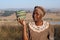 Traditional African Zulu woman selling wire baskets