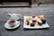 Traditional afternoon tea set on wooden table