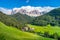 Traditional alpine St Johann church in Val di Funes valley, Santa Maddalena touristic village, Dolomites, Italy.