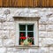 Traditional alpine stone window.