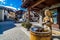 Traditional Alpine wooden architecture, fountain and sculpture, Livigno, Alps