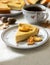 Traditional American pumpkin homemade cake, decorated with cookies on a background of pumpkins and autumn leaves.