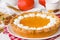 Traditional American pumpkin pie with whipped cream. Thanksgiving cake.