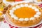 Traditional American pumpkin pie with whipped cream. Thanksgiving cake.
