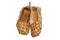 traditional ancient woven bast shoes hanging on the wall isolated