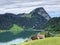 Traditional architecture and farmhouse in the valley of Wagital or Waegital and by the alpine Lake Wagitalersee Waegitalersee