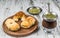 Traditional Argentinian yerba mate tea in calabash gourd and argentine pastries.