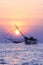 Traditional asia fishing net on sunrise.