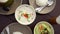 Traditional asian cuisine on table. Top view of authentic thai dishes curry, tom kha soup and rice