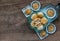 A traditional asian pastry or Tao Sor in vintage green glass bowl. Chinese sweet pastry filled with mung bean paste, taro, and