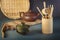 Traditional asian porcelain cup, clay teapot and tea ceremony items on table