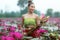 Traditional asian woman harvest red lotus flower in nature river
