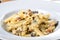 Traditional authentic italian penne al pollo e funghi pasta with mushroom ,chicken, parmesan cheese