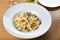 Traditional authentic italian penne al pollo e funghi pasta with mushroom ,chicken, parmesan cheese