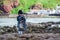 Traditional bagpiper in full dress code near Pennan