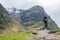 Traditional bagpiper in the scottish highlands