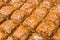 Traditional baklava sweet pastry, arab dessert food at a street food market.