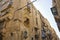 Traditional balconies wooden in a Valletta street - luxury mansions baroque style , Malta