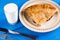 Traditional balkan burek meat pie flat lay above blue wooden background