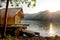 Traditional bamboo raft houses on the lagoon with mountain background at khao wong reservoir Suphanburi province Thailand