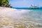 Traditional banca boat in clear water at sandy Beach near El Nido, Philippines