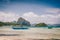 Traditional banca boat in clear water at sandy Corong Beach in El Nido, Philippines