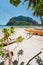 Traditional banca boat on sandy Corong Corong Beach in El Nido, Philippines