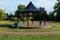 A traditional bandstand located in the middle of a popular park in Woodbridge, Suffolk