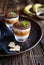 Traditional Banoffee dessert with caramel, banana, biscuit cumbs and whipped cream