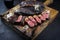 Traditional barbecue dry aged wagyu Brazilian picanha steaks from the sirloin cap of rump beef sliced on a rustic wooden board