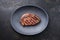 Traditional barbecue dry aged wagyu entrecote beef steak on a modern design cast iron plate
