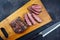 Traditional barbecue wagyu gourmet bavette steak on a modern design wooden board