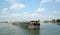 Traditional barges on Chao Phraya river