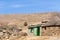 Traditional Basotho Hut with Green Door