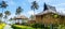 Traditional beach bungalows and coconut palms on Koh Phi Phi isl