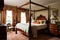 traditional bedroom, with four-poster bed and wooden nightstands