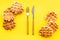 Traditional belgian waffles on served yellow table background top view