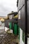 Traditional black wood and stone houses next to the harbour in T