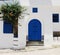 Traditional blue Tunisian metal door with a black pattern