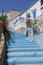 Traditional Blue and White steps to a Greek House with blue sky