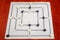 Traditional board for playing Nine Men\'s Morris game